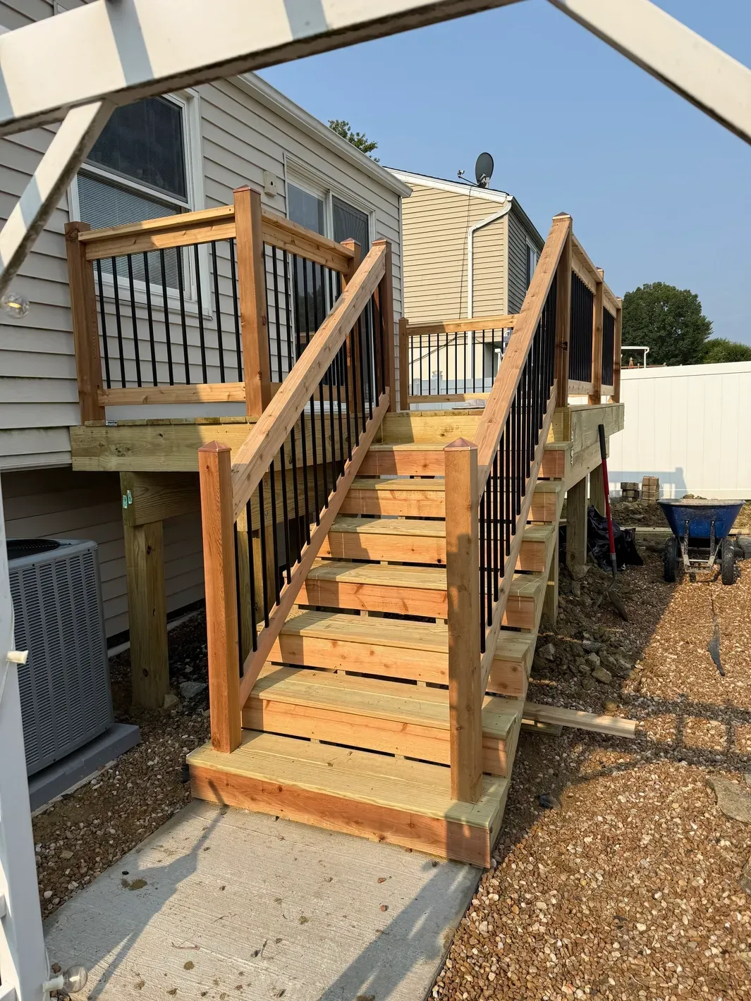 Wooden staircase with metal railings