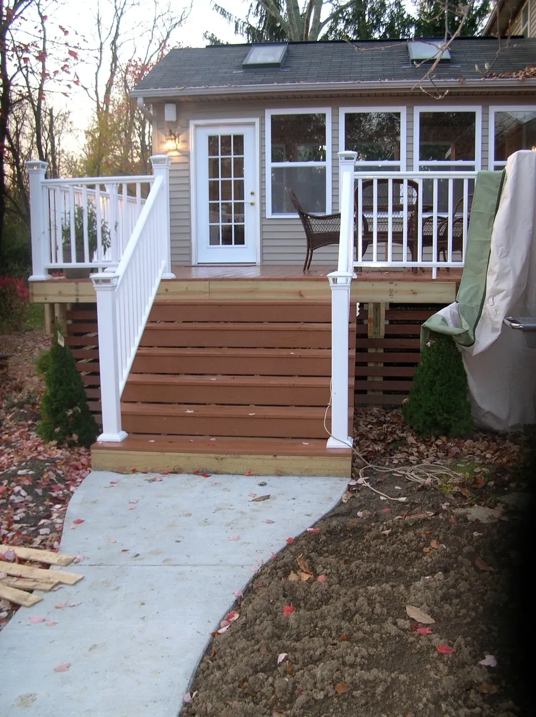 Elevated deck in backyard setting